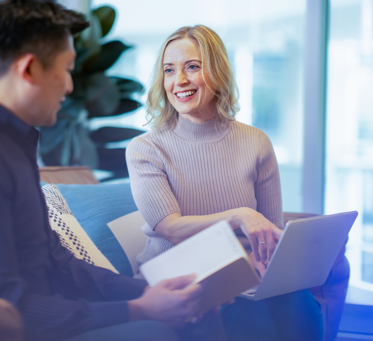 Woman pointing at computer Woman pointing at computer
